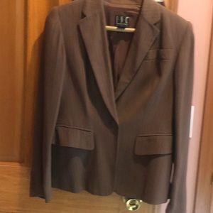 Two piece women’s suit. Inc. Jacket and skirt